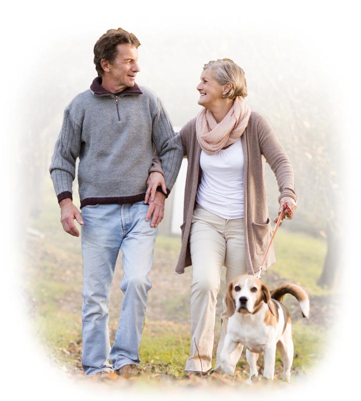 Senior Couple Enjoying a Stroll Through the Park